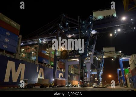 Odessa, Ukraine SIRCA 2019: Container ship at port terminal. Containers loading by crane in night , Trade Port. container operation in port series Stock Photo