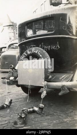 Vintage Just Married Car with Tin Cans,  Just Married Car about 1930s, Stock Photo