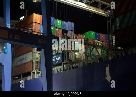 Odessa, Ukraine SIRCA 2019: Container ship at port terminal. Containers loading by crane in night , Trade Port. container operation in port series Stock Photo