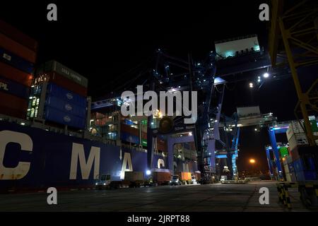 Odessa, Ukraine SIRCA 2019: Container ship at port terminal. Containers loading by crane in night , Trade Port. container operation in port series Stock Photo