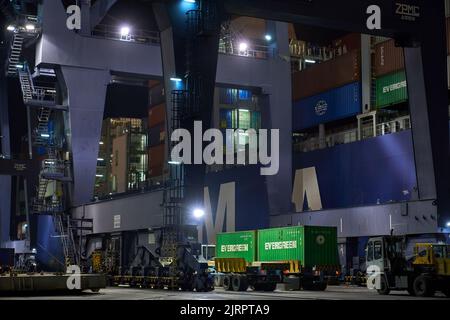 Odessa, Ukraine SIRCA 2019: Container ship at port terminal. Containers loading by crane in night , Trade Port. container operation in port series Stock Photo