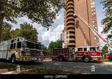 Montgomery County, Maryland fire apparatus stage near a high rise ...