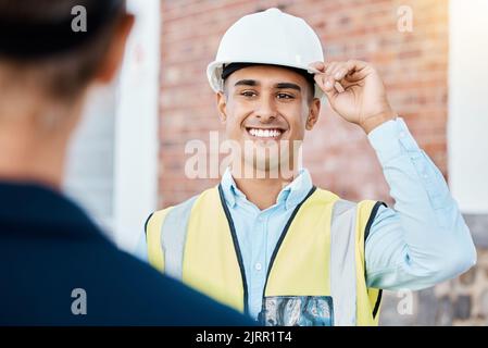 Building, construction and architecture worker with a happy smile ready to start work. Maintenance contractor, builder logistics and building Stock Photo