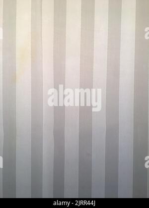 Vertical gray and white striped fabric textile background Stock Photo