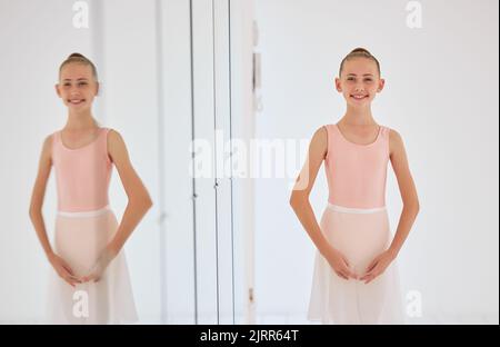 Young ballet dancer dancing in a dance studio or class and learning or training for performance and at school. Portrait of a happy, elegant and Stock Photo