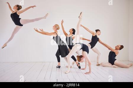 Ballet training, dance students or studio routine with group diversity of ballerina dancers in jump performance for stage or theatre. Creative theater Stock Photo