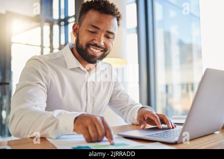 Stock market, accounting and fintech business man happy with company profit and statistics analysis data. Smile of a corporate accountant working on a Stock Photo