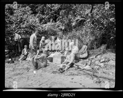 Beach picnic, 1928-1929, Stewart Island, maker unknown. Stock Photo