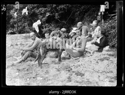 Picnic on the beach, 1928-1929, Stewart Island, maker unknown. Stock Photo