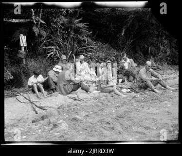 Picnic on the beach, 1928-1929, Stewart Island, maker unknown. Stock Photo