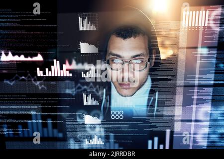 Your data is never secure in the cloud. a young hacker cracking a computer code in the dark. Stock Photo