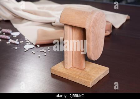 Group of sewing objects lying on a wooden table, flat lay concept of atelier Stock Photo