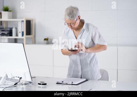Remote Check Deposit Using Mobile Photo Scanning Stock Photo