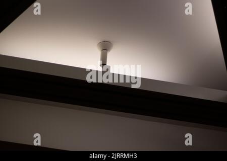 Light design. Lighting equipment on ceiling. Architecture details. Fluorescent lamps. Stock Photo