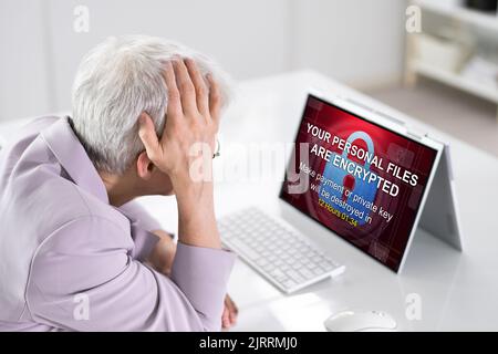 Ransomware Cyber Attack Showing Personal Files Encrypted Screen Stock Photo