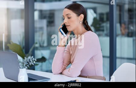 Corporate employee phone call with client, reading calendar on laptop and working in office. Young professional assistant planning and schedule Stock Photo