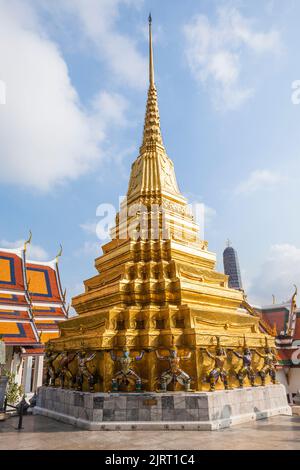 Bangkok, Thailand - January 4, 2010: famous temple Phra Sri Ratana Chedi covered with foil gold in the inner Grand Palace in Bangkok. Stock Photo