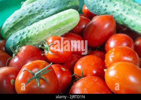 Ripe vegetables for salad preparation. Background of natural foods. Vitamins on the kitchen table Stock Photo