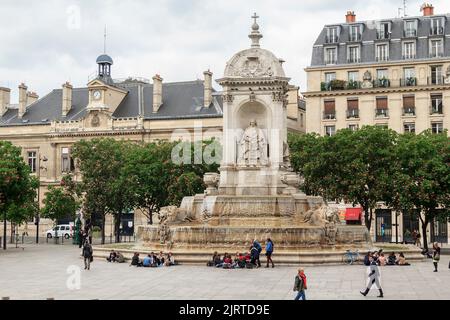Fountain near the Saint-Sulpice church of the same name is a twelve-height stone building in the Renaissance style with waterfalls and ornaments May 1 Stock Photo