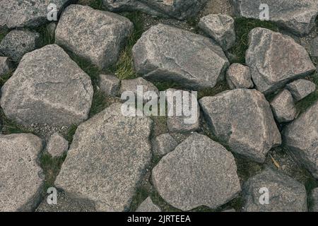 Cobblestone road in the mountains, background texture Stock Photo