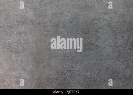 Gray leather texture on the wall. The background Stock Photo