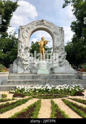 Golden statue of Johann Strauss located in Stadtpark. Famous sightseeing (tourist attraction) in Vienna, Austria Stock Photo