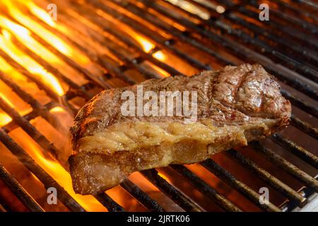 Picanha barbecue roasted over hot coals. This form of barbecue is widely consumed throughout Brazil. Stock Photo
