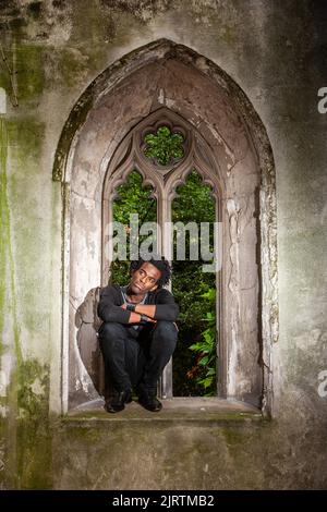 The Sanctuary, meditation. A moment of solitary contemplation for a character in a place of refuge. From a series of related images. Stock Photo