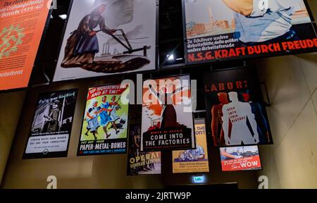 A picture of multiple posters related to the war economy, taken inside the Museum of the Second World War, in Gdansk. Stock Photo