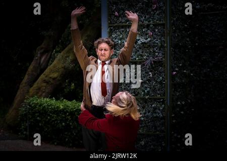 A performance of A Midsummer Night's Dream by The Duke's Theatre Company at Trebah Garden Amphitheatre in Cornwall in the UK. Stock Photo