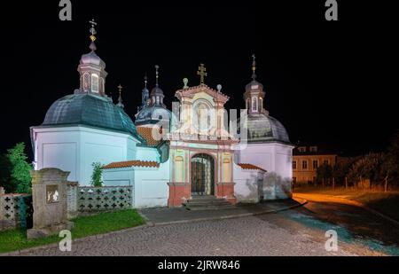 Baroque Church of Assumption of Virgin Mary in Czech Tabor city. Historical building and towers of christian pilgrimage Klokoty Monastery. Night view. Stock Photo