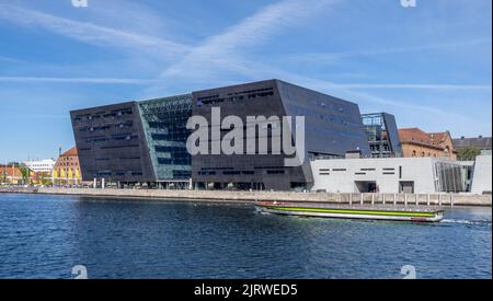 Modern extension of the Royal Danish Library affectionately known as Den Sorte Diamant The Black Diamond on the waterfront in Copenhagen Denmark Stock Photo