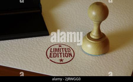 Limited Edition stamp and stamping hand. Exclusive certificate concept. Stock Photo