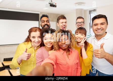 international students and teacher taking selfie Stock Photo