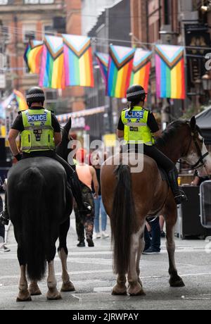 Manchester, UK. 26th Aug, 2022. Mounted police at THE MANCHESTER PRIDE FESTIVAL 2022. Manchester UK.Thursday 25th Aug to Monday 29th August. Manchester Pride, in partnership with Virgin Atlantic, is its annual flagship event that takes over the city every year across the August bank holiday weekend in celebration of LGBTQ+ life. Headliners include Spice Girl Mel C, Duncan Jones and Drag Race UK star Bimini. Credit: GaryRobertsphotography/Alamy Live News Credit: GaryRobertsphotography/Alamy Live News