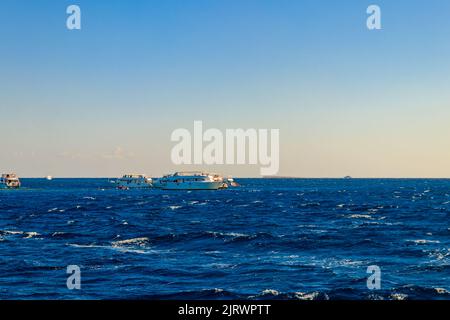 White yachts in Red sea at the sunset Stock Photo - Alamy