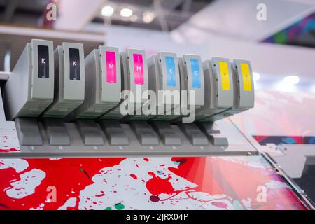 Row of inkjet printer CMYK cartridges - close up Stock Photo