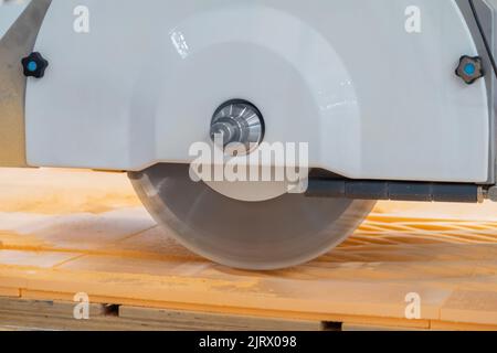 Automatic cnc bridge saw - router profiling system cutting artificial stone Stock Photo