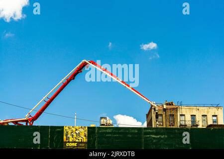 Concrete pumping at the construction of senior affordable housing, replacing the John Q. Aymar building, in Chelsea in New York on Wednesday, August 24, 2022. (© Richard B. Levine) Stock Photo