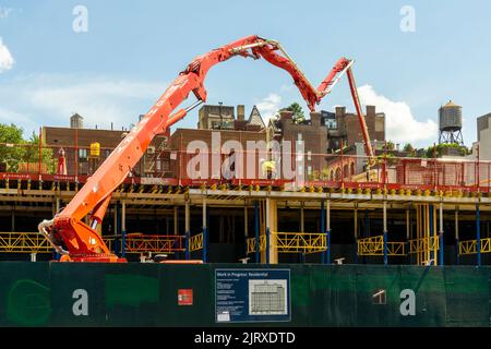 Concrete pumping at the construction of senior affordable housing, replacing the John Q. Aymar building, in Chelsea in New York on Wednesday, August 24, 2022. (© Richard B. Levine) Stock Photo
