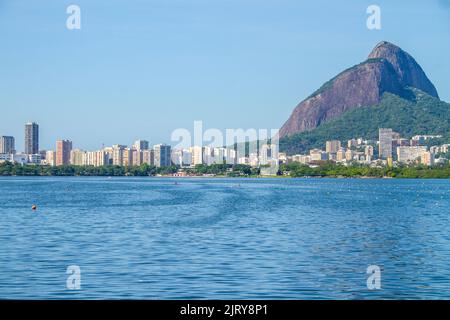view of rodrigo de freitas lagoon with Two Hill Brother in Rio de Janeiro Brazil. Stock Photo