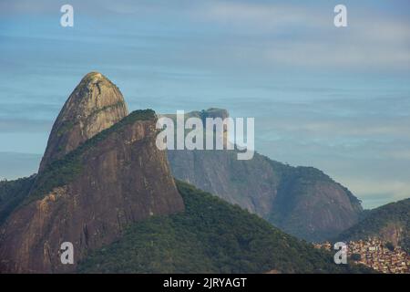 view of the summits of Two Brother Hill ( morro dois irmaos ) and Gavea Stone in rio de janeiro Brazil. Stock Photo