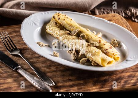 Traditional Slovak and Czech potato dumplings stuffed with goose liver. The original name is Lokse. Stock Photo