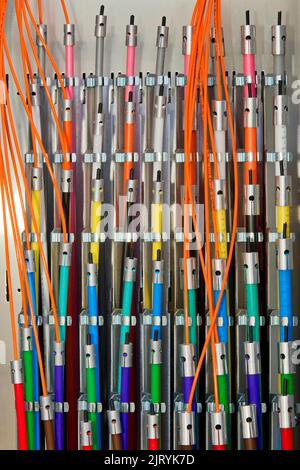 Coloured fibre optic cables for broadband connections, Berlin, Germany Stock Photo