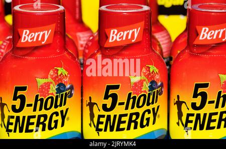 Houston, Texas USA 08-07-2022: 5-hour energy shot drinks, berry flavor closeup on a supermarket display. Manufactured by Living Essentials LLC company Stock Photo