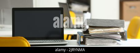 Empty workplace folders with documents in office on table closeup Stock Photo