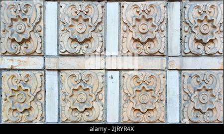 Old stucco tiles weathered and aged Stock Photo
