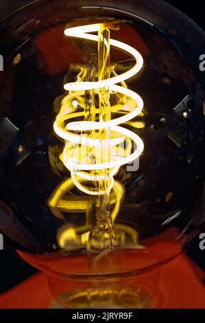 Closeup of filament incandescent light bulb Stock Photo