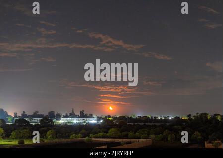beautiful landscape with moonlight and clouds over the sky Stock Photo