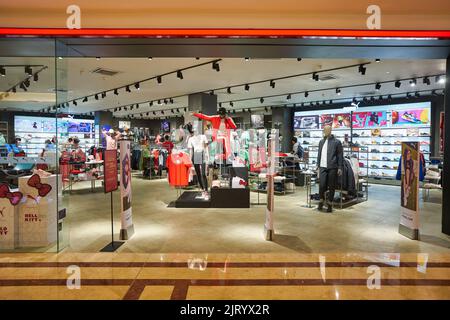 KUALA LUMPUR, MALAYSIA - CIRCA JANUARY, 2020: entrance to Puma store in Suria KLCC shopping mall in Kuala Lumpur. Stock Photo